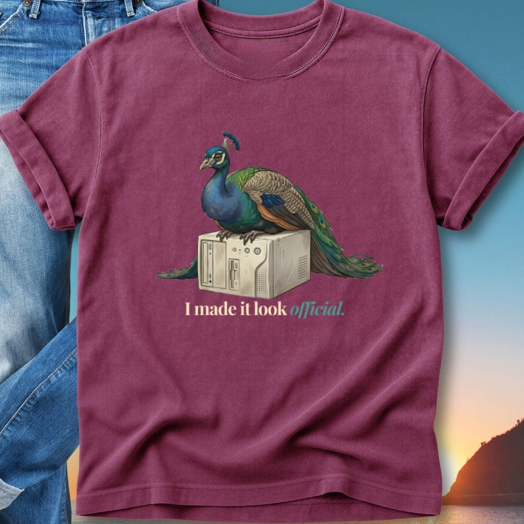 Peacock sitting on a vintage computer, text reads "I made it look official."