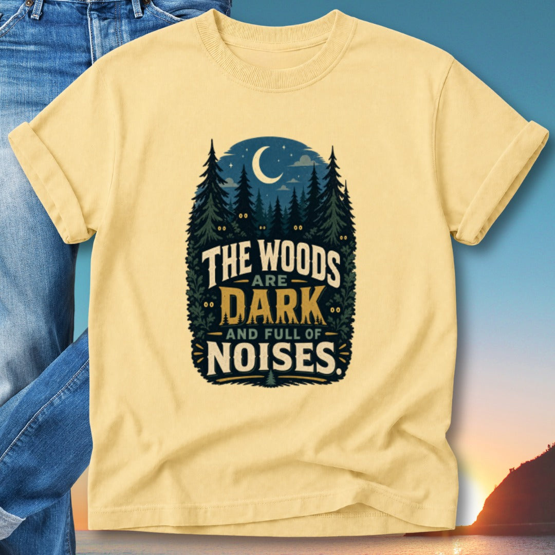Yellow t-shirt with "The woods are dark and full of noises" text and forest graphic.