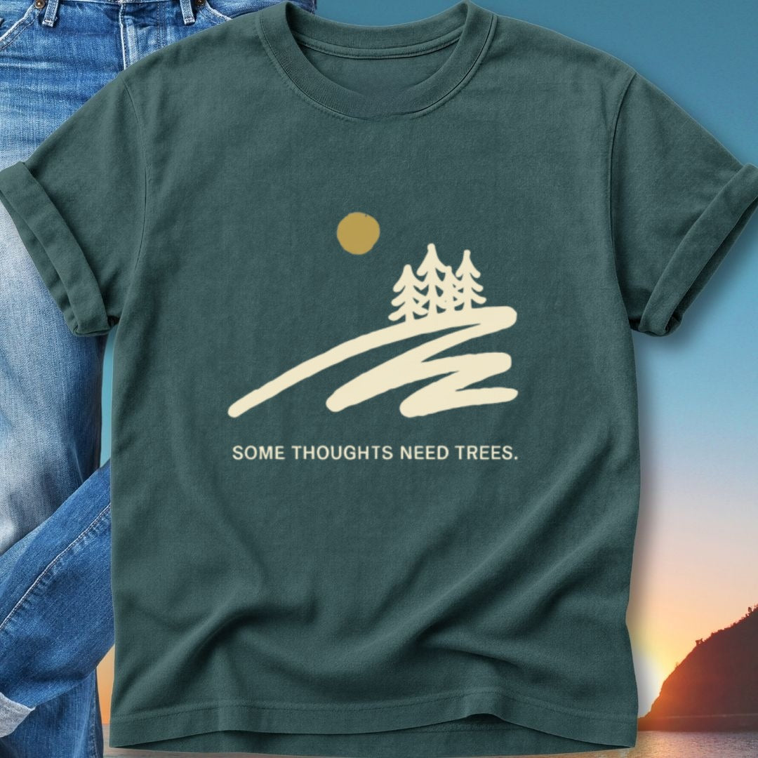 Teal t-shirt with stylized trees, sun, and the text "SOME THOUGHTS NEED TREES."