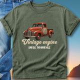 Green t-shirt with vintage red truck and text "Vintage engine. Long idle. Then maybe hills."