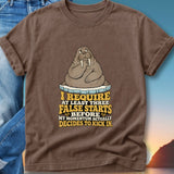Brown t-shirt with walrus illustration and text about momentum.