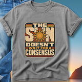 T-shirt with "The Sun Doesn't Wait For A Consensus" text and sun graphic.