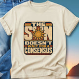Cream t-shirt with "The sun doesn't wait for a consensus" graphic.