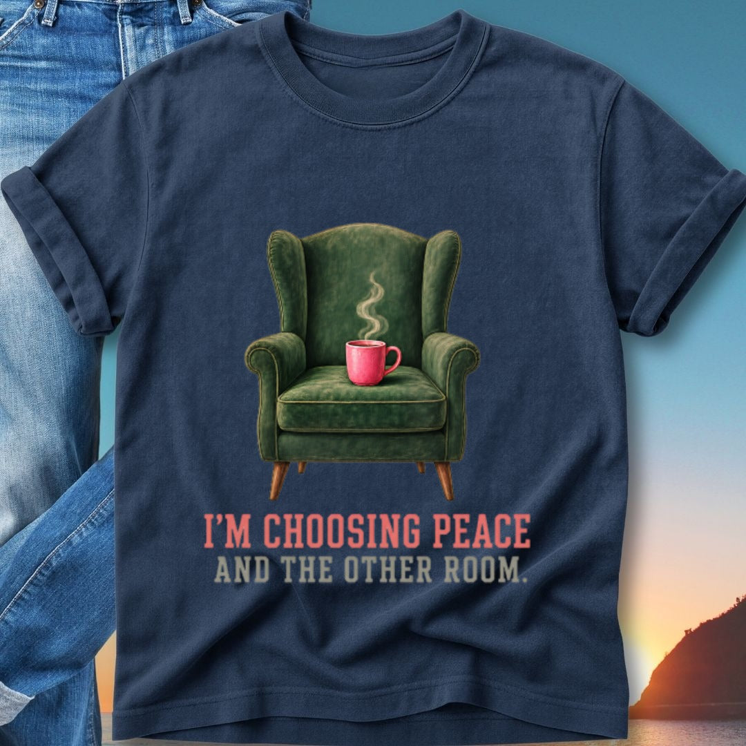 Navy t-shirt with green armchair and pink mug, reads "I'm choosing peace and the other room."