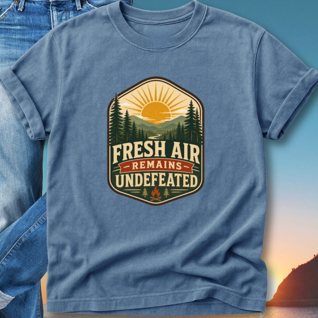 T-shirt with "Fresh Air Remains Undefeated" text and outdoor nature graphic.