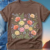 Brown t-shirt with a colorful floral illustration of poppies and ferns.