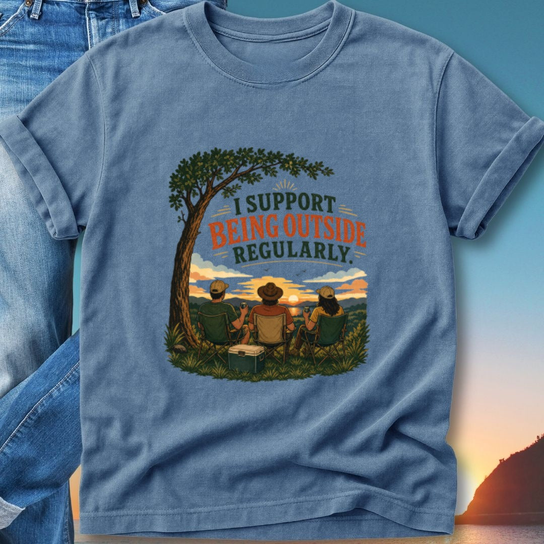 T-shirt graphic with text "I support being outside regularly" and three people watching a sunset.