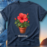 Navy t-shirt with a blooming red hibiscus flower in a terracotta pot.