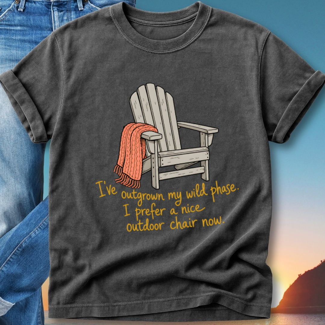 Dark t-shirt with graphic of Adirondack chair and orange blanket, text reads "I've outgrown my wild phase. I prefer a nice outdoor chair now."