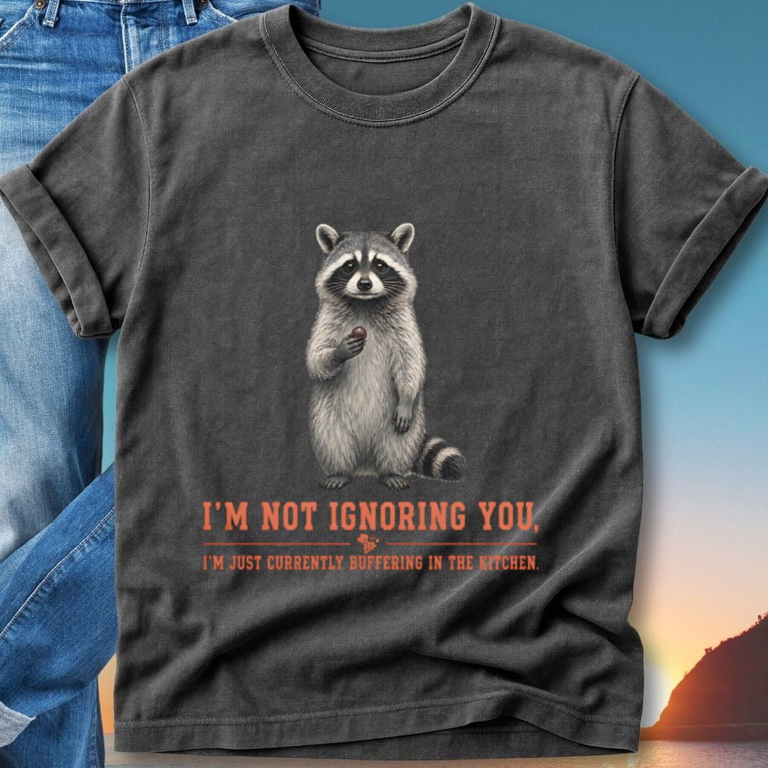 Raccoon holding berry, "I'm not ignoring you. I'm just buffering in the kitchen." text.