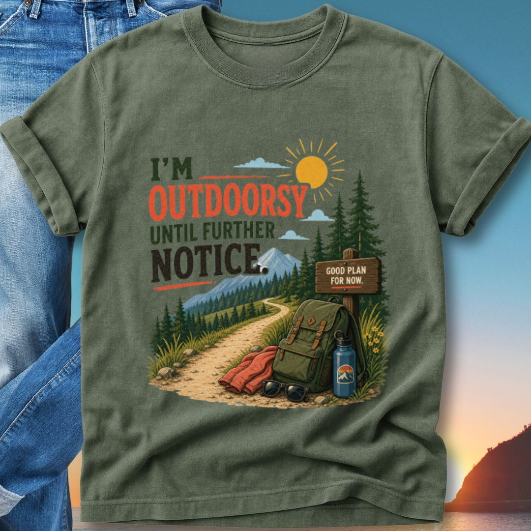 Green t-shirt with "I'm Outdoorsy Until Further Notice" text and mountain graphic.