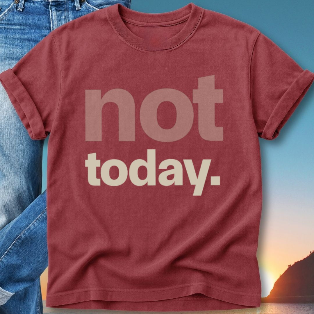 Red t-shirt with "not today." text, worn with jeans, sunset background.