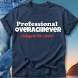 Navy t-shirt with "Professional Overachiever" and "I delegate like a boss!" text.