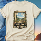 T-shirt with framed scenic landscape and "Hello, Beautiful" text.