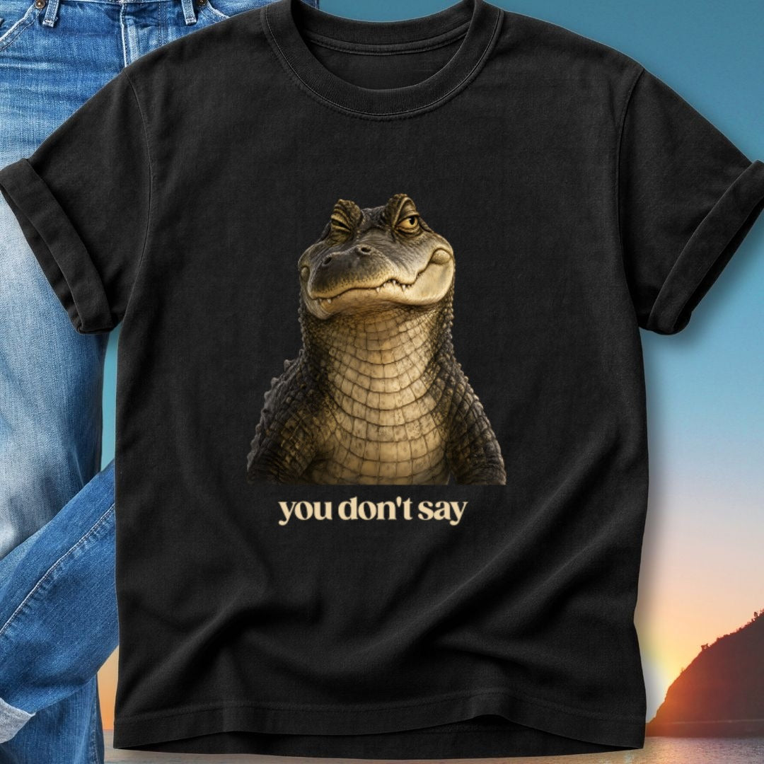Black t-shirt with a close-up realistic portrait of an alligator and text "you don't say".