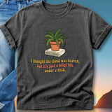 T-shirt with plant on router and quote about a beige box under a desk.