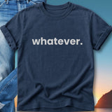 Navy t-shirt with white "whatever." text, folded over jeans.