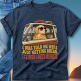 Golden retriever in a car with luggage, text reads "I WAS TOLD WE WERE JUST GETTING BREAD. IT'S BEEN FORTY MINUTES."