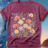 Maroon t-shirt with a floral watercolor design of poppies, roses, and ferns.