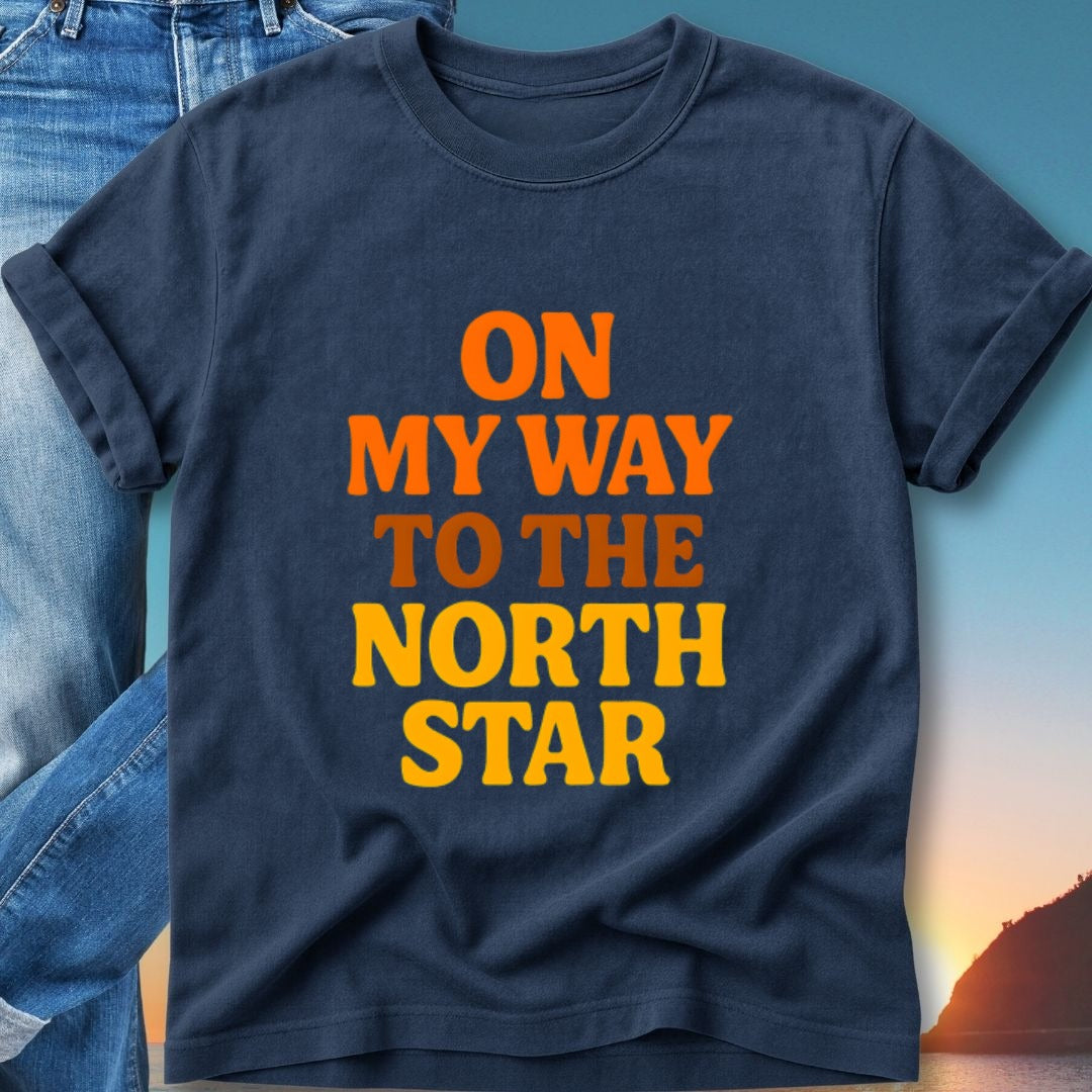 Navy t-shirt with orange and yellow text "ON MY WAY TO THE NORTH STAR".