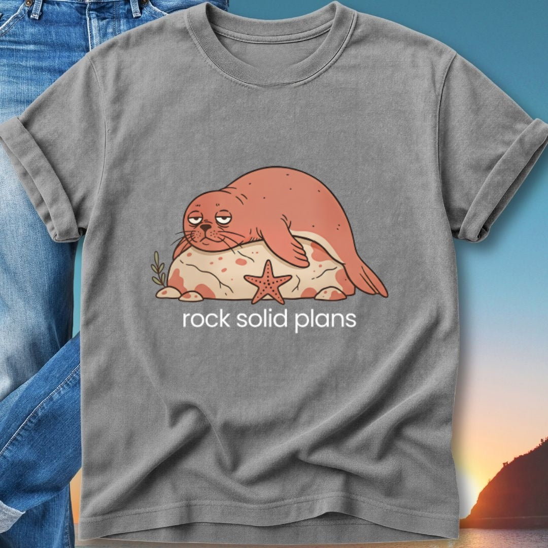 T-shirt with cartoon seal on a rock and starfish, text "rock solid plans".
