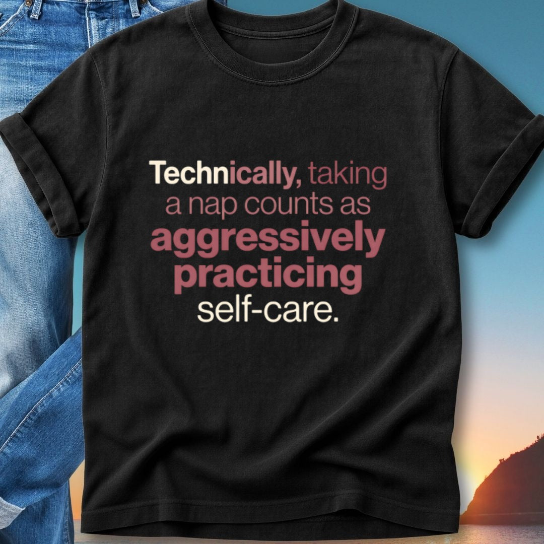 Black t-shirt with text "Technically, taking a nap counts as aggressively practicing self-care."