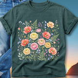 Dark green t-shirt featuring a watercolor floral print with pink, yellow, and orange flowers.