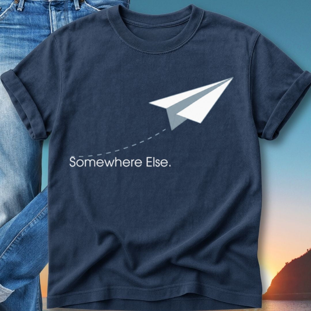 Navy t-shirt with white paper airplane graphic and "Somewhere Else." text.