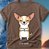 Brown t-shirt with a smiling chihuahua wearing a blue bandana, text reads "it is well."
