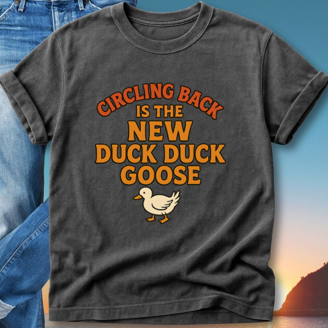 T-shirt with text "Circling back is the new duck duck goose" and a goose illustration.