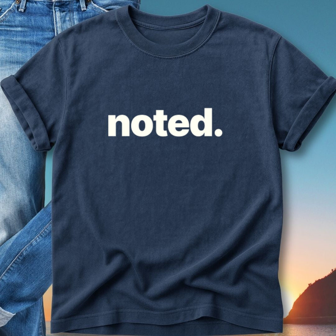 Navy t-shirt with "noted." printed in white text.