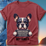 French bulldog mugshot with "NOT GUILTY" text on burgundy t-shirt.