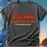 Dark t-shirt with "I'm not burnt out" and "I'm just lightly toasted." text.