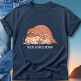 Navy t-shirt with cartoon seal on a rock with text "rock solid plans".