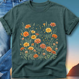 Dark teal t-shirt with a watercolor floral print featuring orange and yellow marigolds.