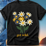 Black t-shirt with a bouquet of yellow and white daisies and the text "get wild."