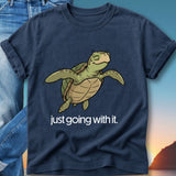 Navy t-shirt with cartoon turtle and text "just going with it."