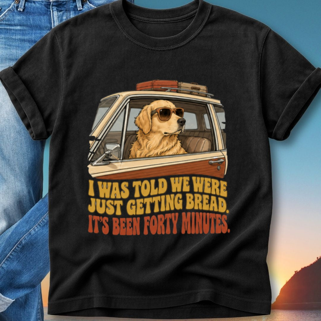 Golden retriever in car with sunglasses, text: "I was told we were just getting bread. It's been forty minutes."