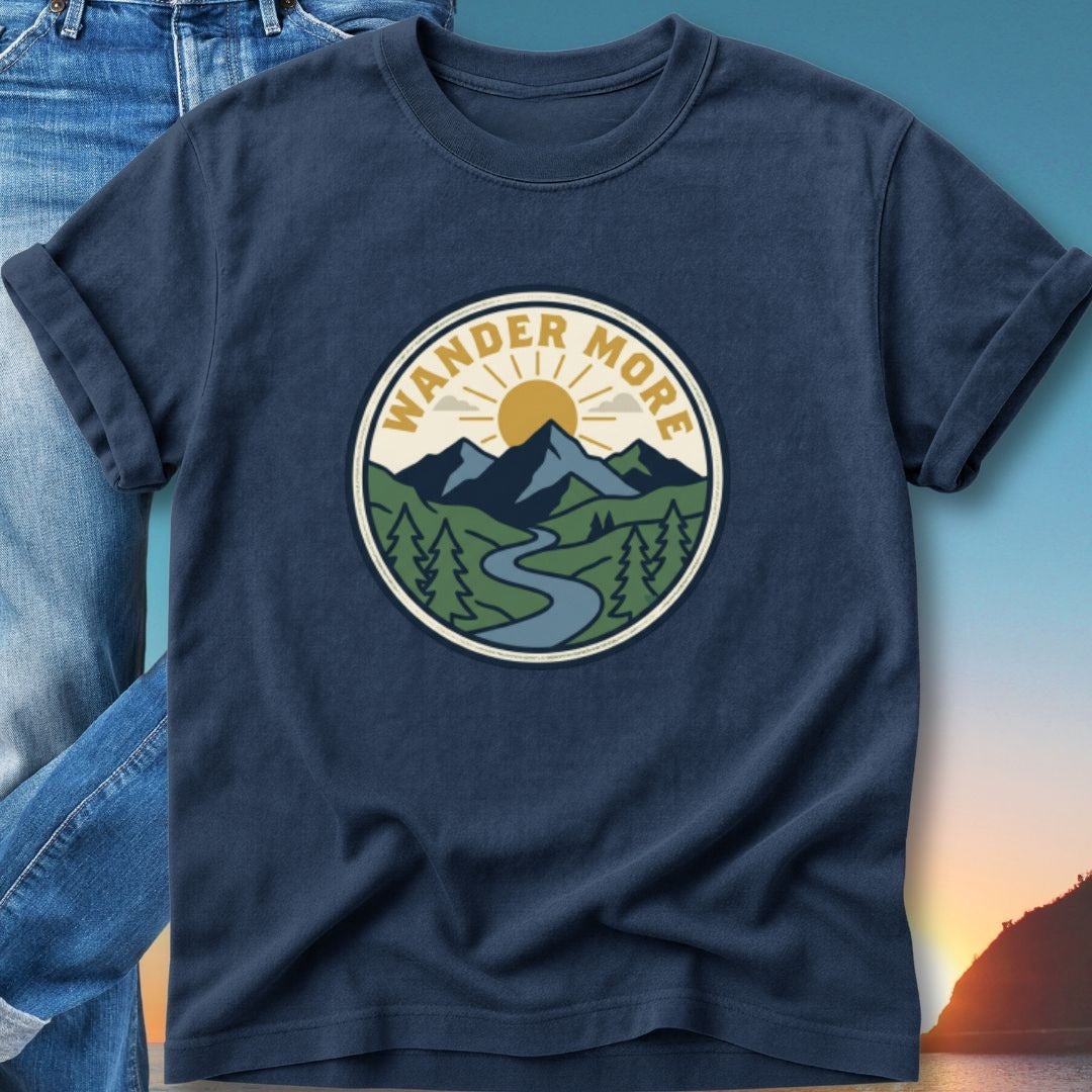 Navy t-shirt with a circular "Wander More" outdoor scene graphic.
