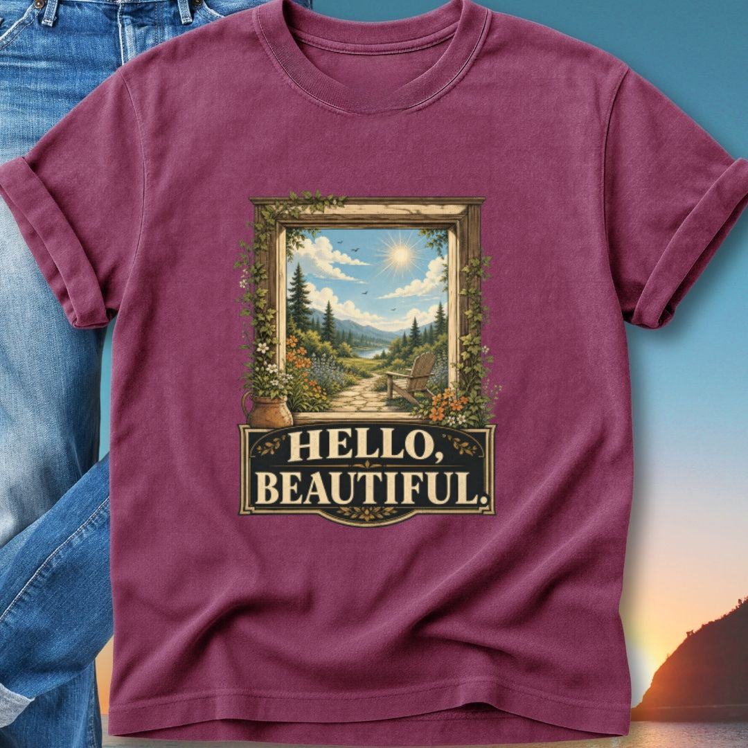 T-shirt with a floral frame showcasing a scenic landscape and "Hello, Beautiful." text.