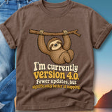 Brown t-shirt with a sloth hanging from a branch, text reads "I'm currently Version 4.0".