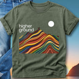 Olive t-shirt with "Higher Ground" text and colorful mountain landscape.