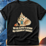 T-shirt graphic with a seashell house, crab, and inspirational text.