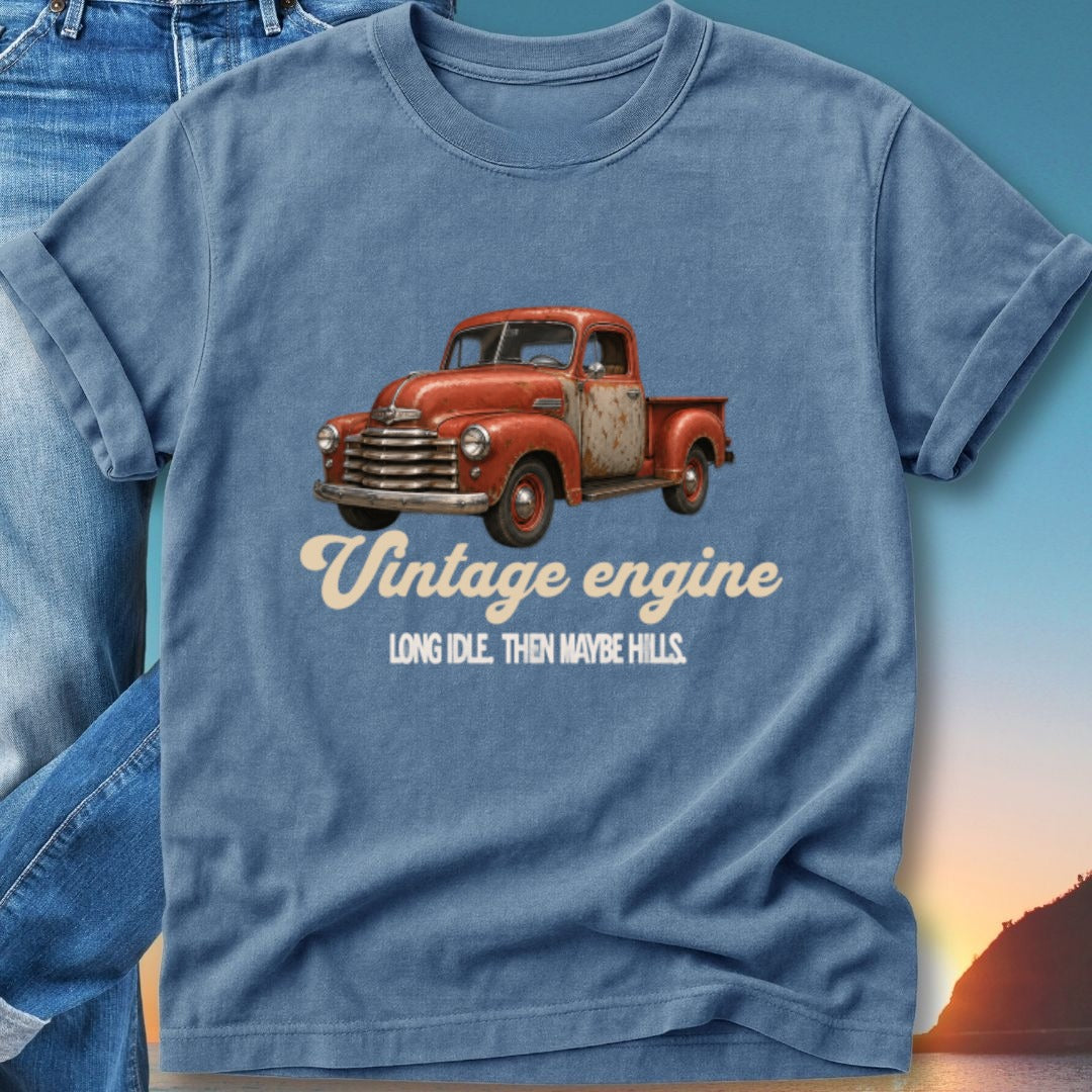 Red vintage pickup truck with "Vintage Engine" text on blue t-shirt.