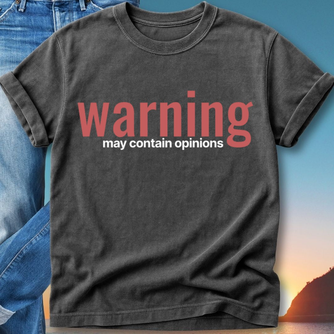 Dark t-shirt with "warning may contain opinions" in red text.