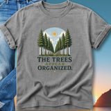 T-shirt with a vintage graphic of trees forming an organized path under a sunlit sky.