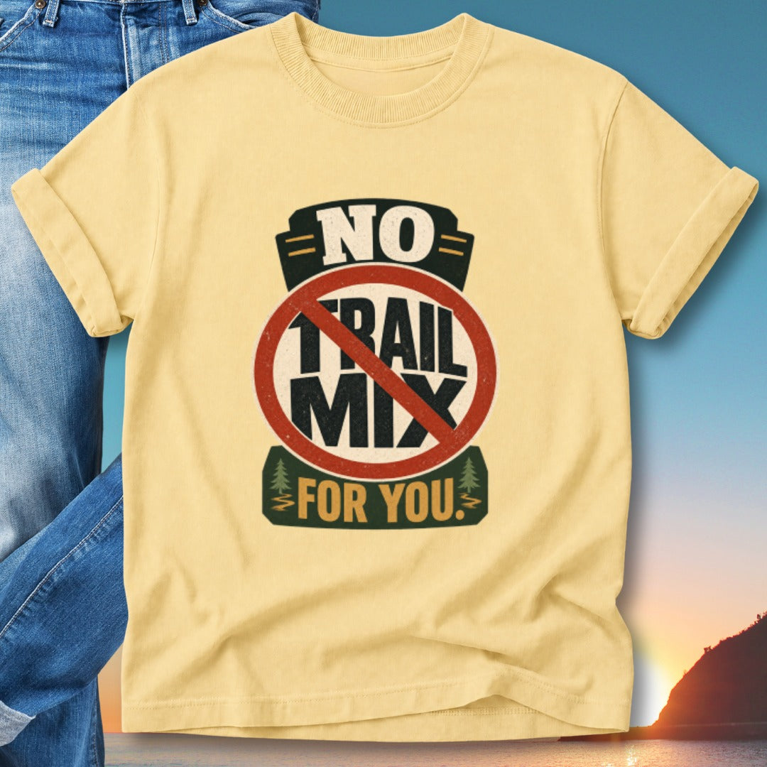 Yellow t-shirt with "No Trail Mix For You" graphic and sunset background.