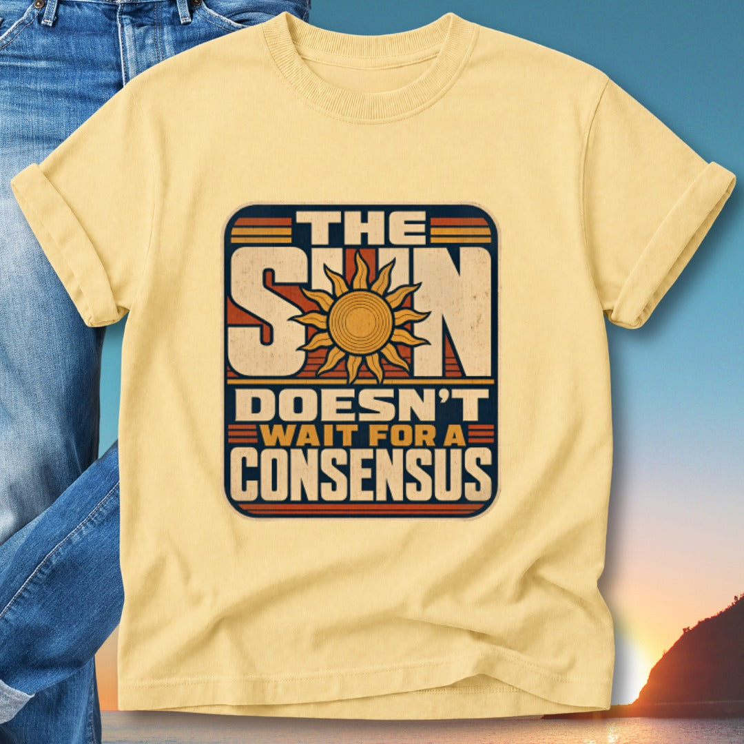 Yellow t-shirt with "The Sun Doesn't Wait For A Consensus" graphic.
