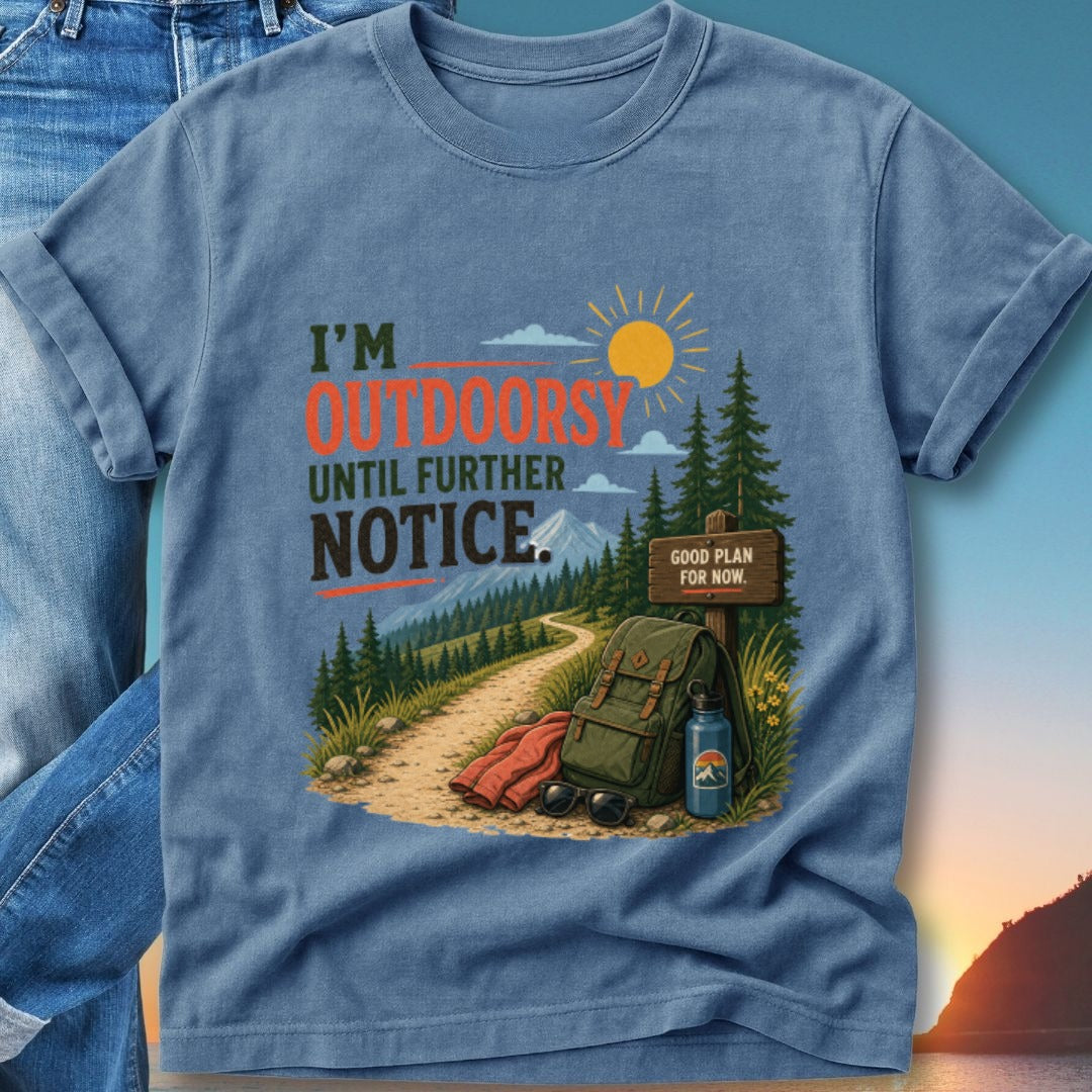 T-shirt with "I'm outdoorsy until further notice" graphic and hiking gear.