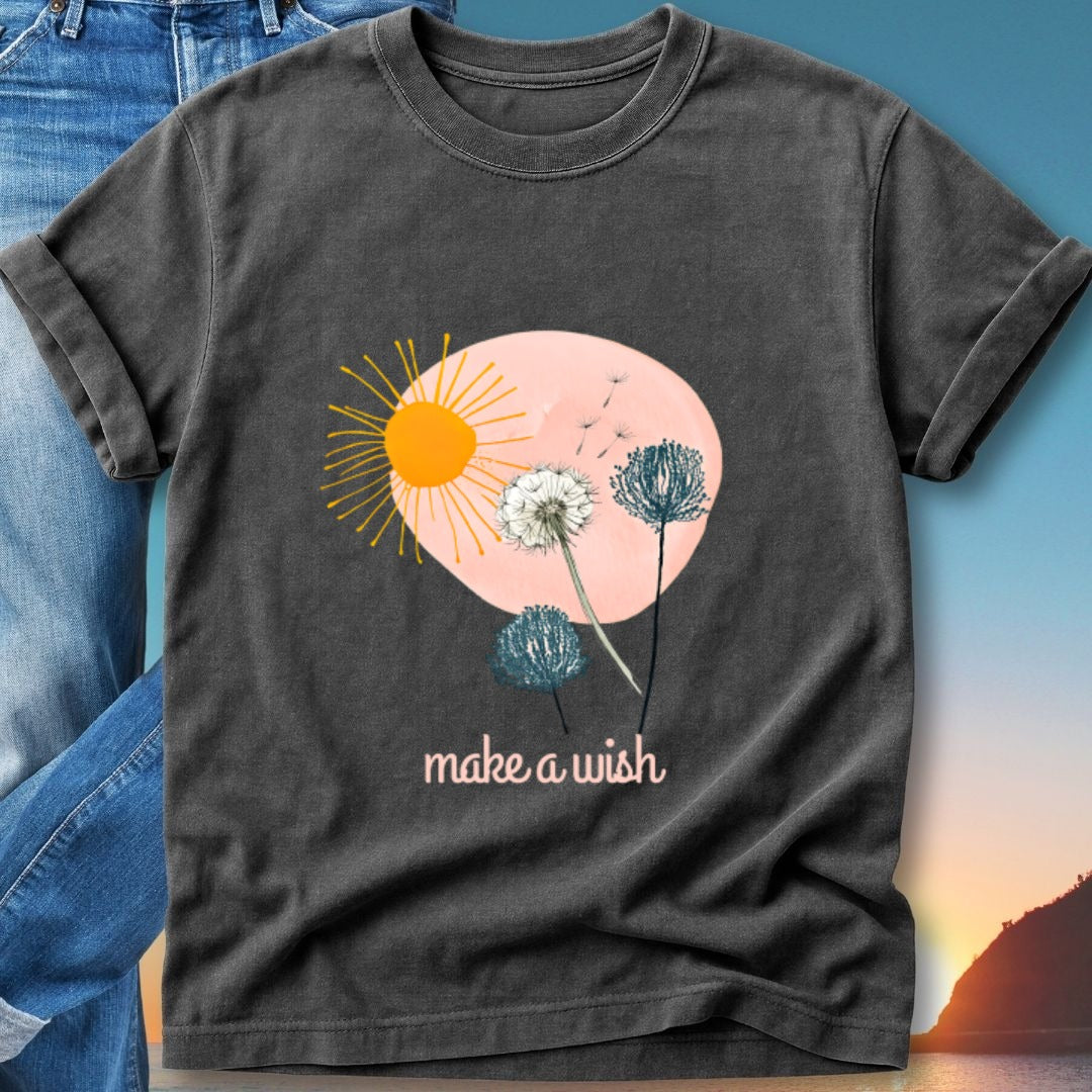 Dark t-shirt with sun, dandelions, and "make a wish" text.